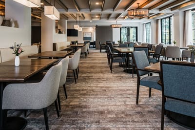 Interior dining area with tables and chairs