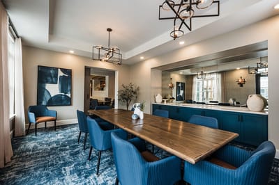 Bright and modern common area with table and chairs