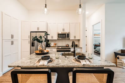 Modern kitchen space with dining table setup