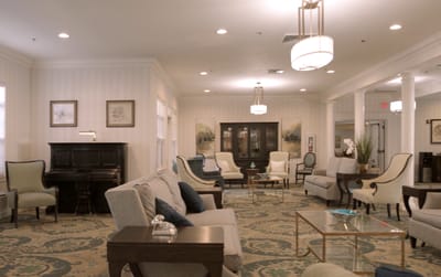 Bright common area with comfortable seating and decor