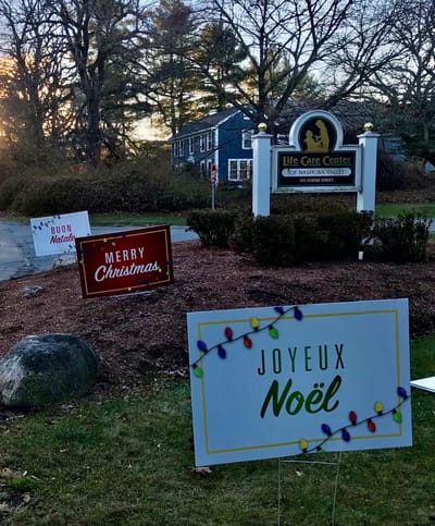 Facility sign with holiday greetings outside