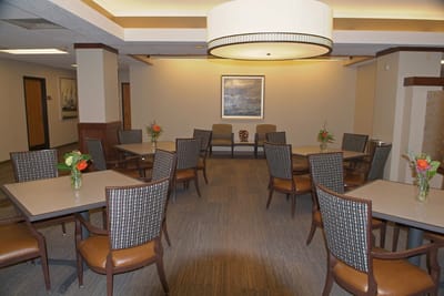 Interior view of a common area with tables and chairs
