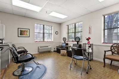 Hair salon with styling chairs and light natural decor