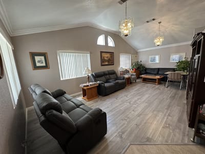 Cozy common area with seating and natural light