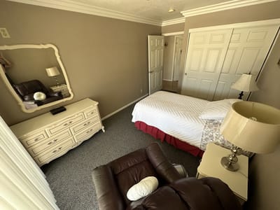 Cozy resident room with a bed and furniture
