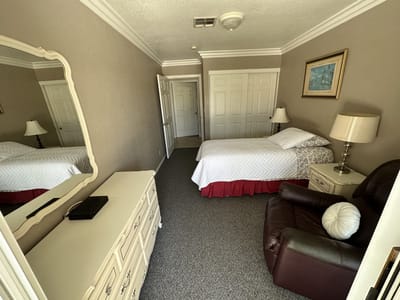 Interior view of a private resident room with a bed and furniture
