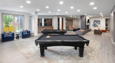 Interior common area with pool tables and seating