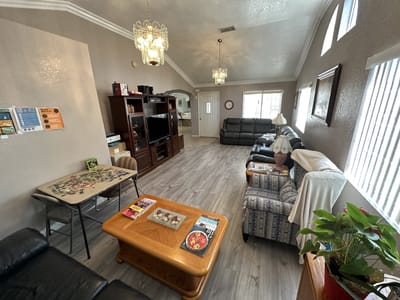 Bright common area with seating and decor