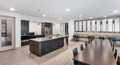 Bright dining area with modern kitchen
