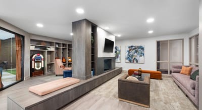 Interior lounge area with seating and games