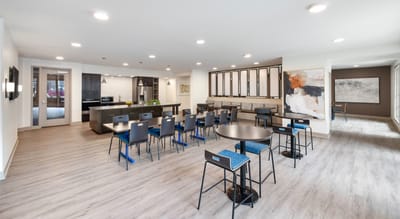 Bright common area with seating and modern decor