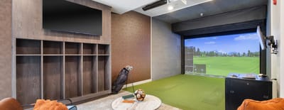 Interior golf simulator area in the facility