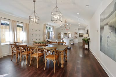 Spacious common area with dining table and decor