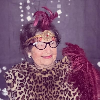 Resident dressed in festive attire for a celebration