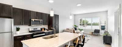 Modern kitchen and living area in a senior apartment