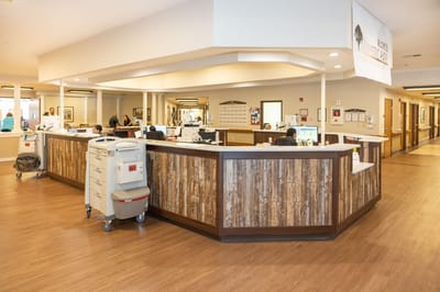 Interior view of the nursing facility with staff and residents