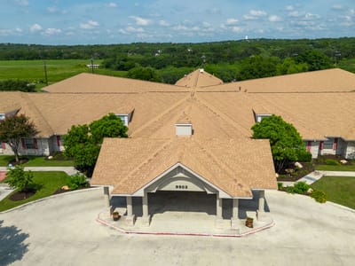 Aerial view of the nursing facility entrance and landscaping