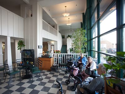 Residents enjoying time in a spacious common area