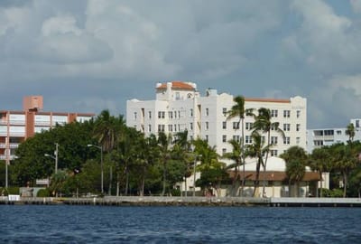 Exterior view of the assisted living facility by the water
