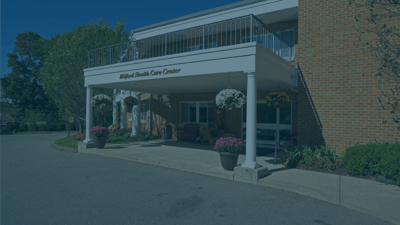 Exterior view of Milford Health Care Center entrance