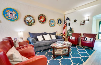 Comfortable common area with military memorabilia