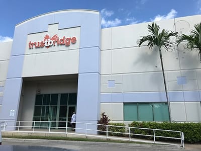 Exterior view of Trustbridge Hospice Care building.