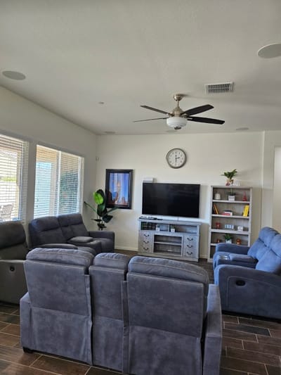 Cozy common area with seating and a television