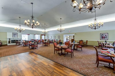 Interior dining room with elegant chandeliers and seating