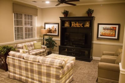 Cozy lounge area with chess decor and seating
