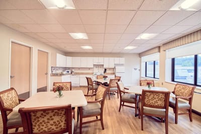 Bright dining area with tables and chairs