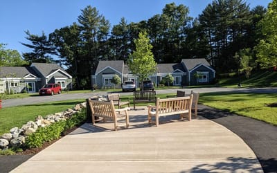 Outdoor seating area with benches and scenic view