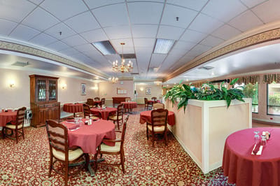 Interior view of a dining area with tables and decor
