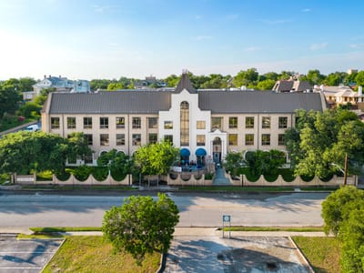 Aerial view of San Pedro Manor building and outdoor area.