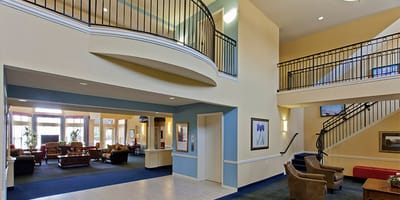 Bright interior of a senior living facility common area