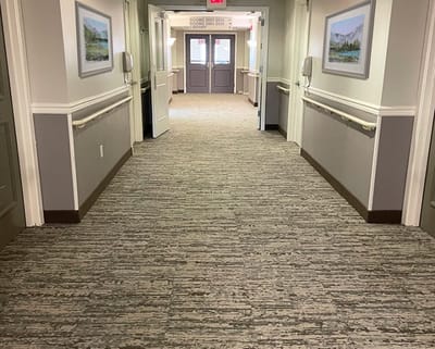 A long hallway in a senior living facility