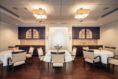 Bright dining room with tables and chairs