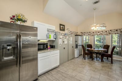 Modern kitchen area with seating for dining