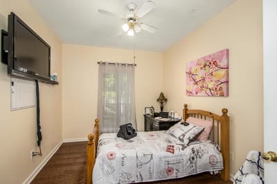 Cozy private room with a bed and TV