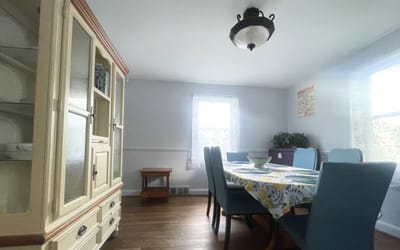 Bright dining room with a table and chairs
