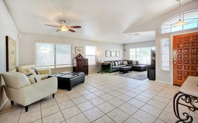 Bright common area with seating and windows