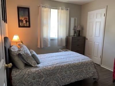 Cozy private room with bed and furnishings