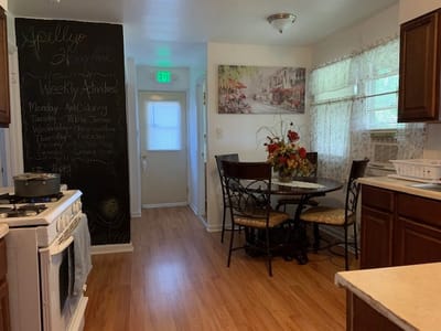 Interior dining area with a chalkboard and seating