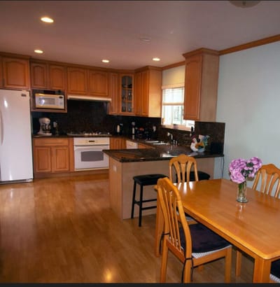 Bright kitchen and dining area in an assisted living facility