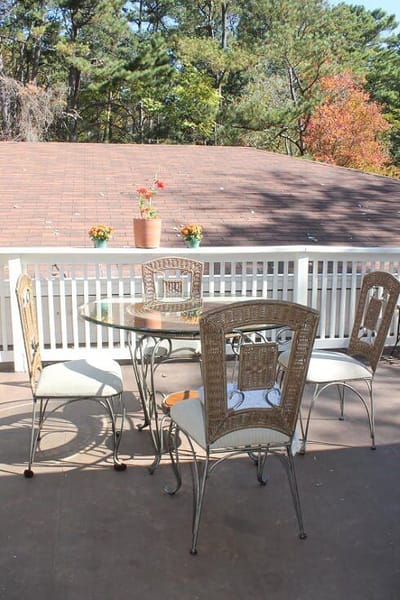 Outdoor seating area with a table and chairs