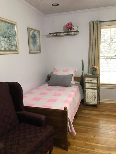 Cozy resident room with a bed and decorations