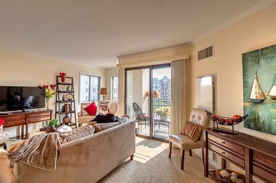 Bright common area with a view of a balcony