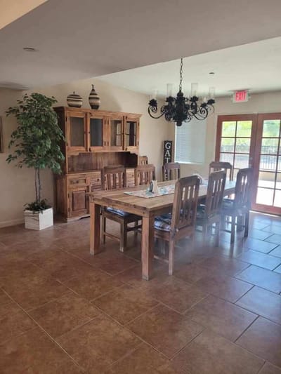 Dining area with wooden table and chairs