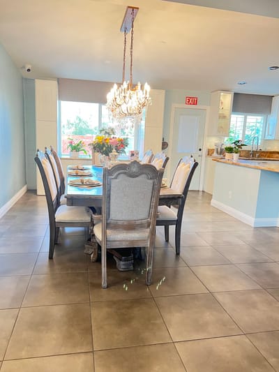 Elegant dining room setup with a chandelier