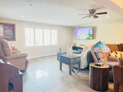 Bright common area with comfortable seating and decor