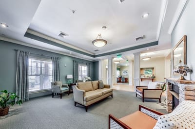 Bright common area with seating and natural light